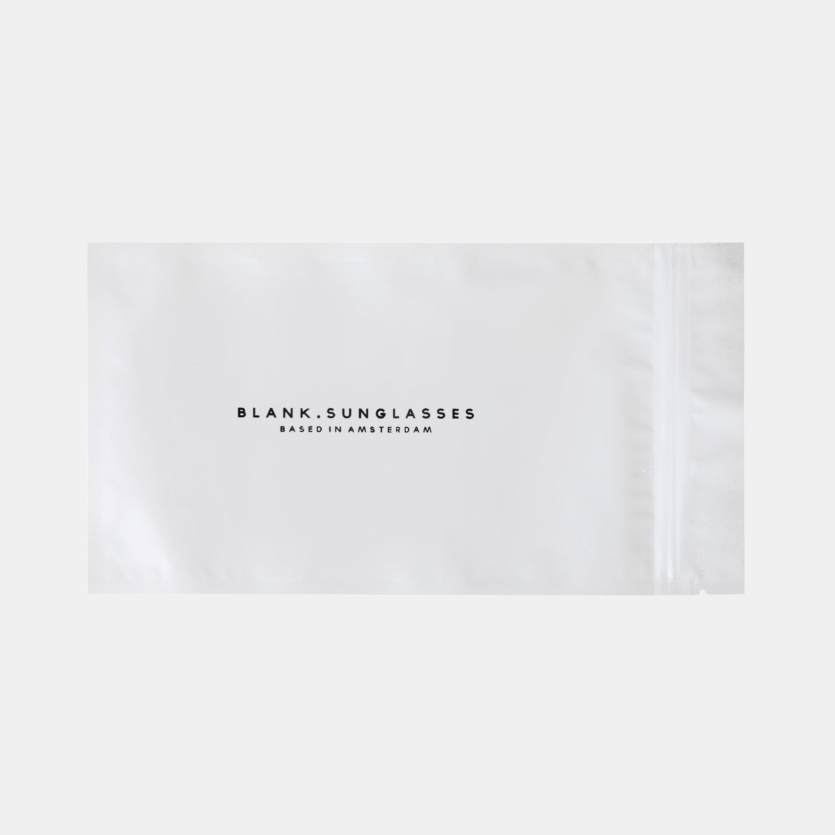 SONNENBRILLEN-TASCHENANHÄNGER.